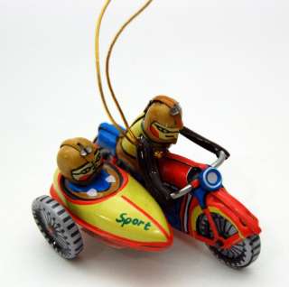   features a motorcycle with sidecar and includes a gold thread ready to