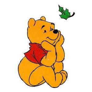 Pooh Bear sitting hands under chin watching leaf fall Disney Iron On 