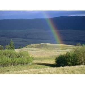  Rainbow Touches Down on a Plain After an Evening Rainstorm 