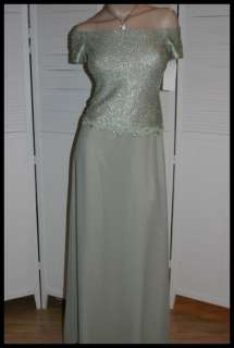 Details Beautiful long formal gown, top has metallic fiber added and 