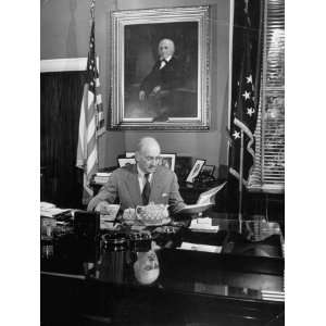 Secy. of the Treasury Henry Morgenthau Jr. Eating Lunch at His Desk 