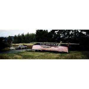  Upturned Derelict Boat with Stars and Stripes Painted on 