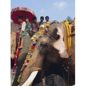 Mahoot and Boys on Decorated Elephants at a Roadside Festival, Kerala 