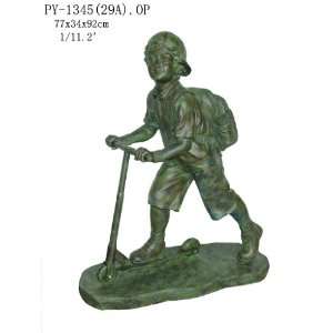 Young Boy Riding Scooter Statue