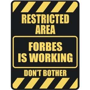   RESTRICTED AREA FORBES IS WORKING  PARKING SIGN