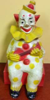 Vintage Plastic Clown Holding Guitar Coin Bank  