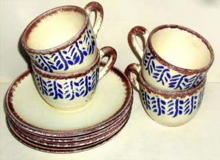   tall and 4 1/4 from handle to rim. The saucers have a diameter of 6 1