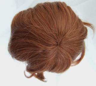 Auction is for 1 synthetic doll wig size 11/12.