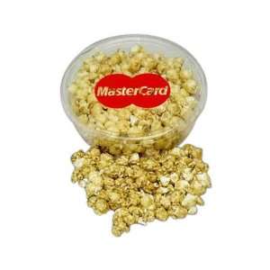   Designer plastic tray filled with caramel popcorn.