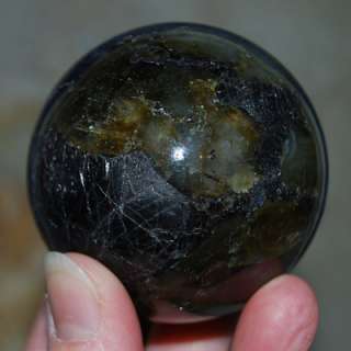   beautiful labradorite sphere with a hematite ring stand included