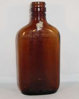 This listing is for a 1920s prohibition liquor bottle. The bottle is 