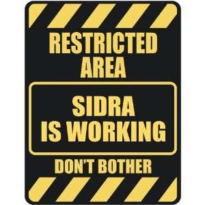   RESTRICTED AREA SIDRA IS WORKING  PARKING SIGN