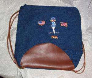 PATRIOTIC LADY & SYMBOLS ON A DENIM BACKPACK  