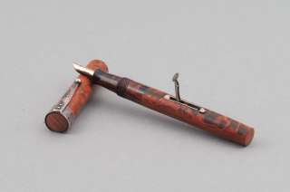 Hardmuth lever filler red brown marbled 18ct nib  