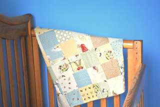  this is a designer handmade patchwork baby blanket 