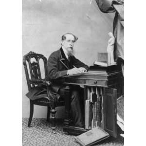 1867 Photo of Charles Dickens seated at desk. Size 7x10. Quality Med 