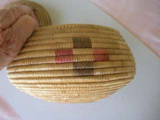 Antique Inuit coiled lidded basket, colors slightly faded
