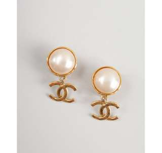 Chanel gold faux pearl dangling logo clip on earrings