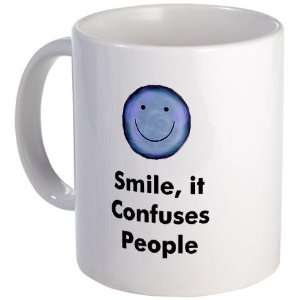  Smile, it Confuses People Yoga Mug by  Kitchen 