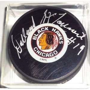 Dollard St. Laurent Autographed Hockey Puck   *CHICAGO BLACKHAWKS* COA 