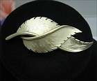 PAIR of CROSSING LEAVES BROOCH