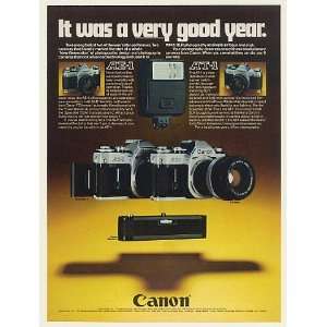  AE 1 AT 1 SLR Camera Very Good Year Print Ad (52294)