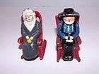 Vintage Cast Iron Salt and Pepper Shakers Amish Couple in Rocking 