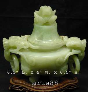   is carved from a piece of serpentine jade in china it consist of