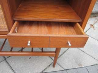   AND CANED BAR CABINET MID CENTURY WITH ONE DRAWER AND CUBBY  