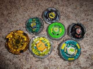 BEYBLADE LOT WITH HELL KERBECS. INCLUDES DOUBLE LAUNCER 2 RIP CORDS 7 