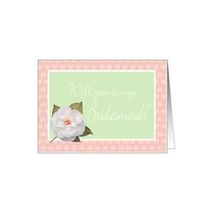   Invitation white camelia on pale green background.frame of pink hearts