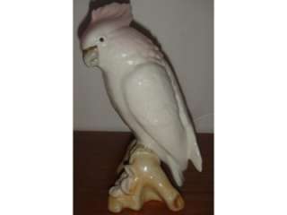 The item presented for sale is a vintage Royal Dux Cockatoo figurine 
